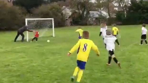 Watch coach/dad push kid to make save