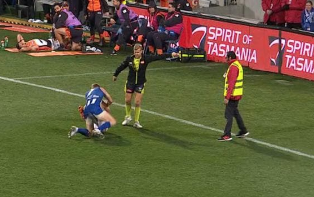 Crazy footage of security guard trying to break up fight in AFL game
