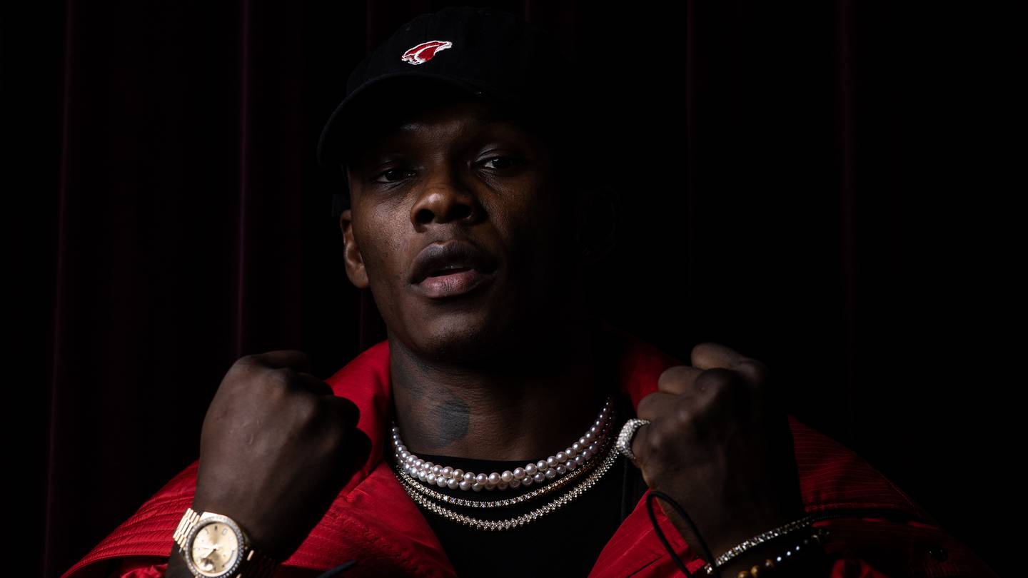 Israel Adesanya's $200k of "art", generous gesture to teammates