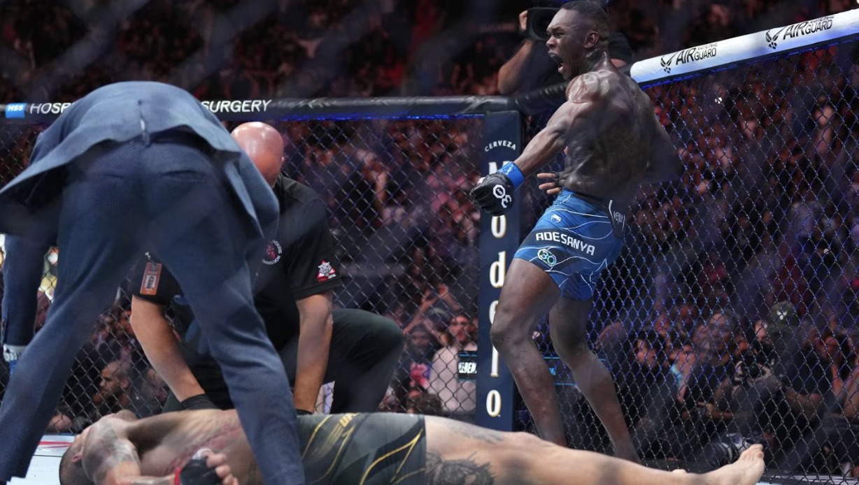 Adesanya knocks out longtime rival for UFC title