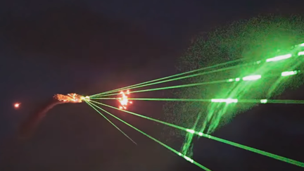 Plane shoots lasers at crowd to the soundtrack of Darude's "Sandstorm"